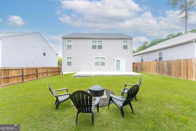 3993 Makeover Ct, South Fulton, GA 30349 - back of property with a patio and a fire pit