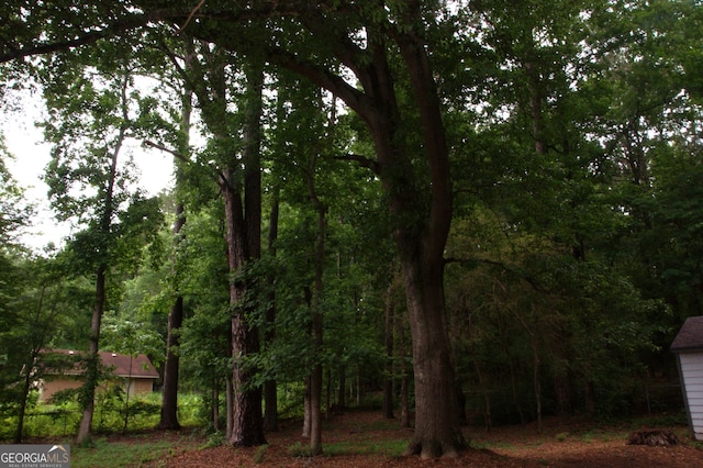3857 Pointers Way SW, Conyers, GA 30094 - view of yard with a forest view
