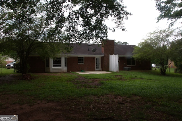 3857 Pointers Way SW, Conyers, GA 30094 - rear view of property with a patio, cooling unit, and a yard
