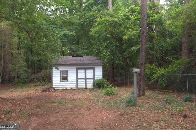 3857 Pointers Way SW, Conyers, GA 30094 - view of shed featuring a forest view