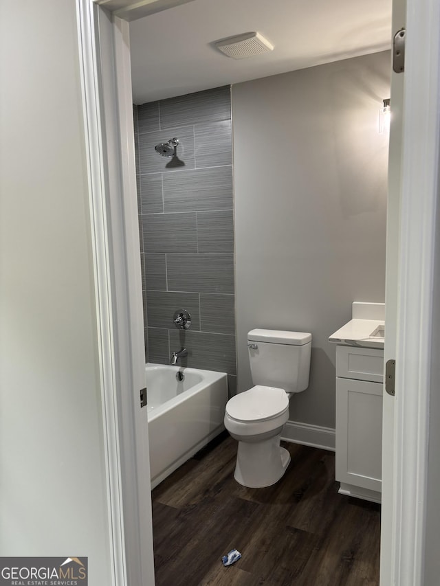 1030 Keller Rd, Mount Airy, GA 30563 - full bath featuring vanity, wood finished floors, and tub / shower combination