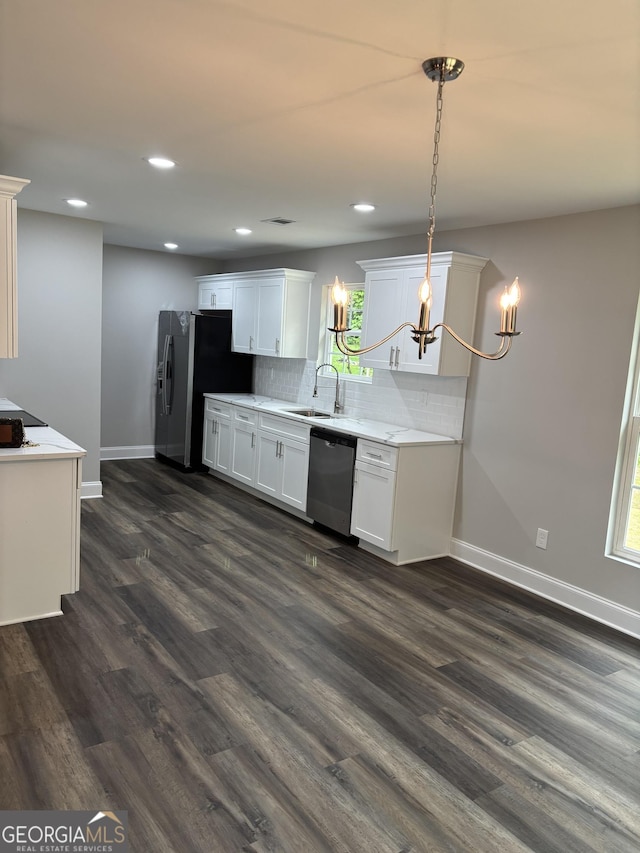 1030 Keller Rd, Mount Airy, GA 30563 - kitchen with appliances with stainless steel finishes, a chandelier, dark wood-style floors, decorative backsplash, and recessed lighting