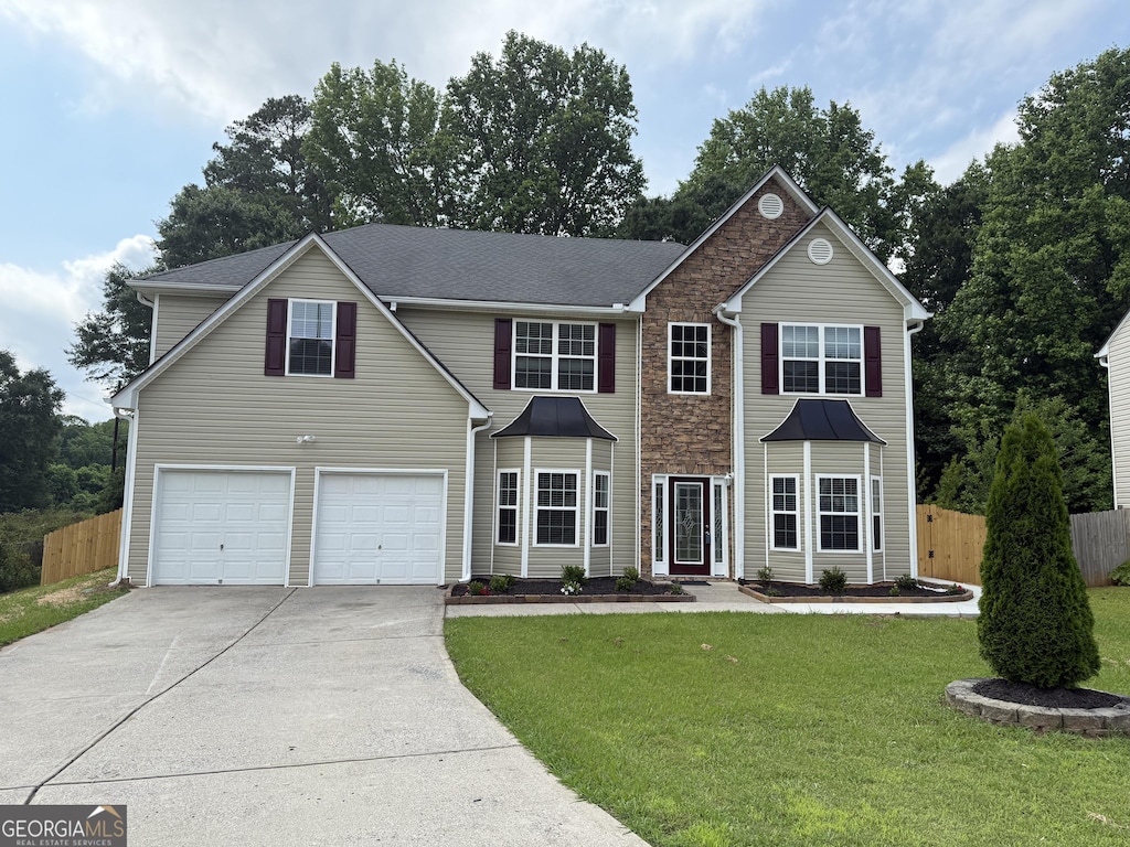 4805 Madison Point Cir, Austell, GA 30106 - view of front of home featuring concrete driveway and an attached garage