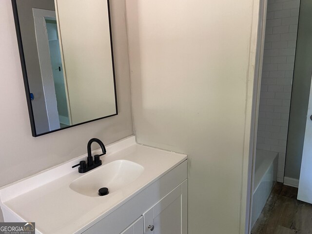 1 E 4th St, Aragon, GA 30104 - full bath featuring vanity and wood finished floors