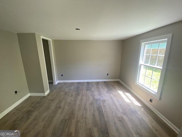 1 E 4th St, Aragon, GA 30104 - spare room with dark wood finished floors and baseboards