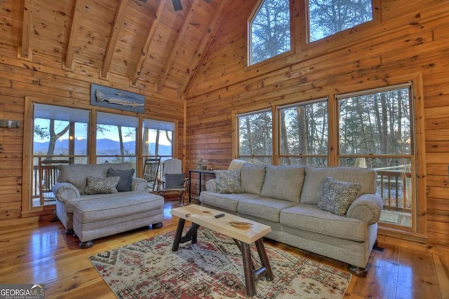 355 Cohutta Mountain Rd, Cherry Log, GA 30522 - living area with wooden ceiling with exposed beams, wood-type flooring, high vaulted ceiling, a mountain view, and wood walls