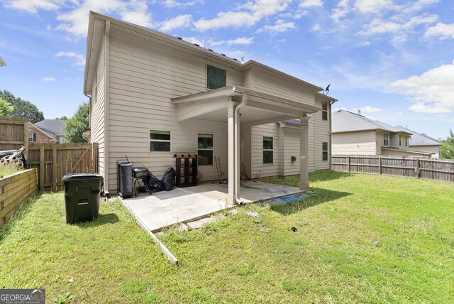 240 Somerset Dr, Dallas, GA 30132 - rear view of house featuring a patio