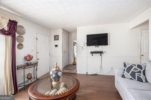 3244 Hampton Ct, Smyrna, GA 30082 - living room featuring wood finished floors and a textured ceiling