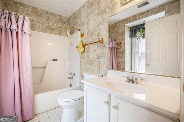 3244 Hampton Ct, Smyrna, GA 30082 - bathroom featuring toilet, shower / bath combo with shower curtain, vanity, a textured ceiling, and wallpapered walls