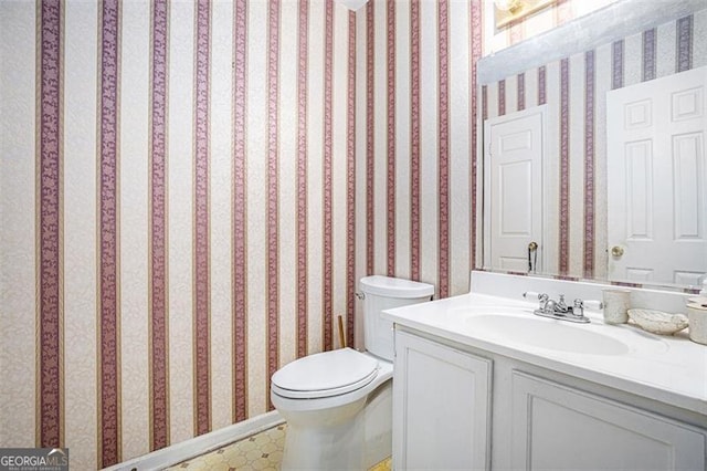 3244 Hampton Ct, Smyrna, GA 30082 - bathroom featuring vanity, toilet, tile patterned floors, and wallpapered walls