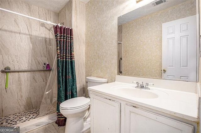 3244 Hampton Ct, Smyrna, GA 30082 - bathroom featuring toilet, vanity, and a tile shower