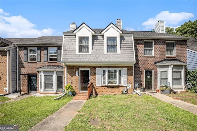 3244 Hampton Ct, Smyrna, GA 30082 - multi unit property with a chimney, a front lawn, and brick siding
