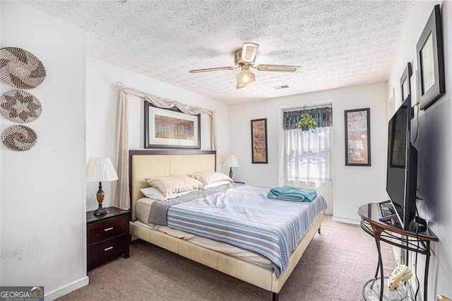 3244 Hampton Ct, Smyrna, GA 30082 - carpeted bedroom with a textured ceiling, a ceiling fan, and baseboards