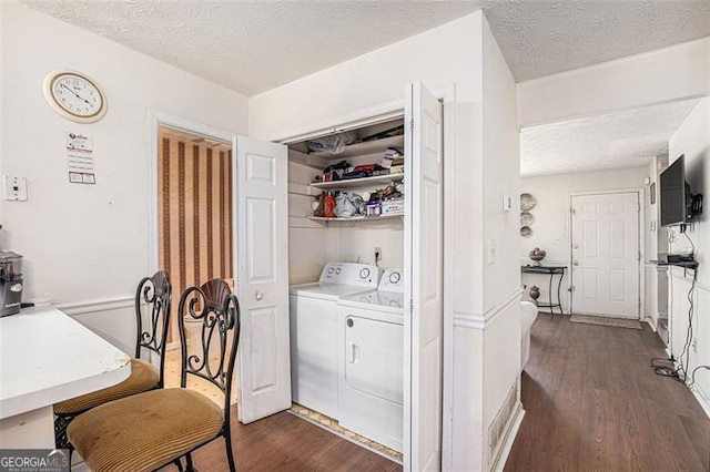 3244 Hampton Ct, Smyrna, GA 30082 - laundry room featuring washer and dryer, a textured ceiling, and dark wood-style floors