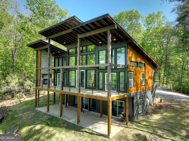 840 Arp Rd, Mineral Bluff, GA 30559 - back of property with a patio area