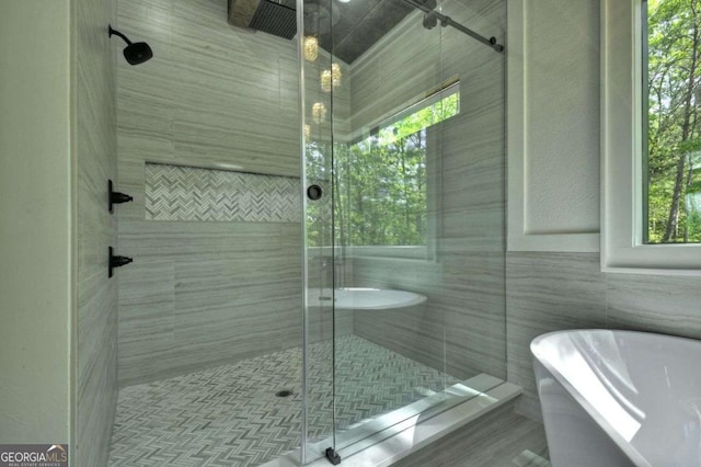 840 Arp Rd, Mineral Bluff, GA 30559 - full bathroom with a freestanding tub and a stall shower