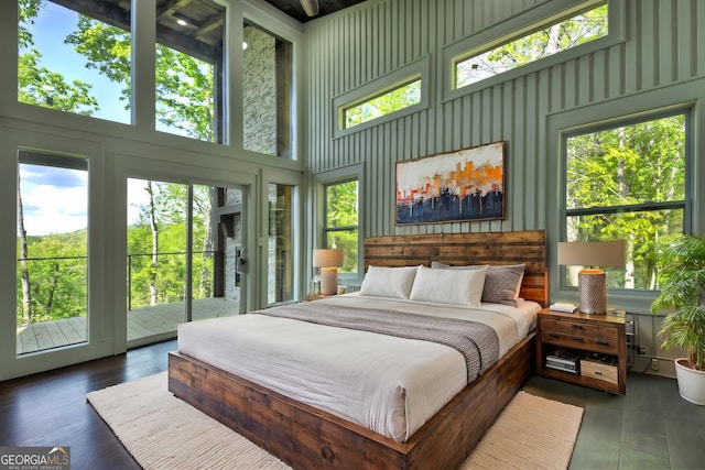 840 Arp Rd, Mineral Bluff, GA 30559 - bedroom featuring access to exterior, a towering ceiling, and wood finished floors