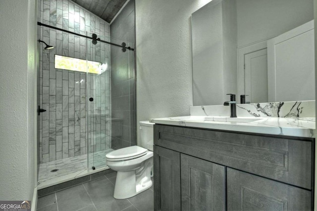 840 Arp Rd, Mineral Bluff, GA 30559 - bathroom with toilet, vanity, a stall shower, tile patterned floors, and a textured wall