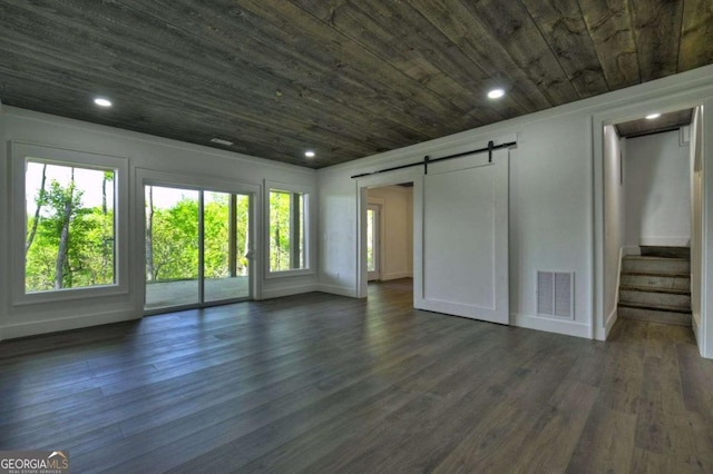 840 Arp Rd, Mineral Bluff, GA 30559 - unfurnished living room featuring a barn door, wood ceiling, dark wood-style floors, baseboards, and stairs