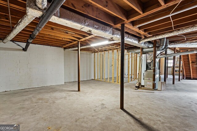 315 Burke Cir, Mcdonough, GA 30253 - unfinished basement with heating unit and concrete block wall
