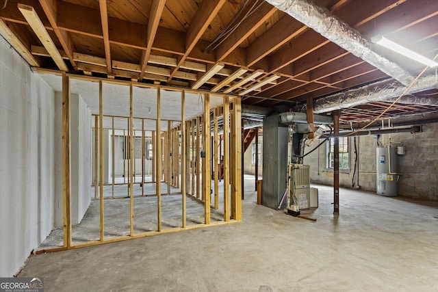 315 Burke Cir, Mcdonough, GA 30253 - basement featuring water heater, concrete block wall, and heating unit