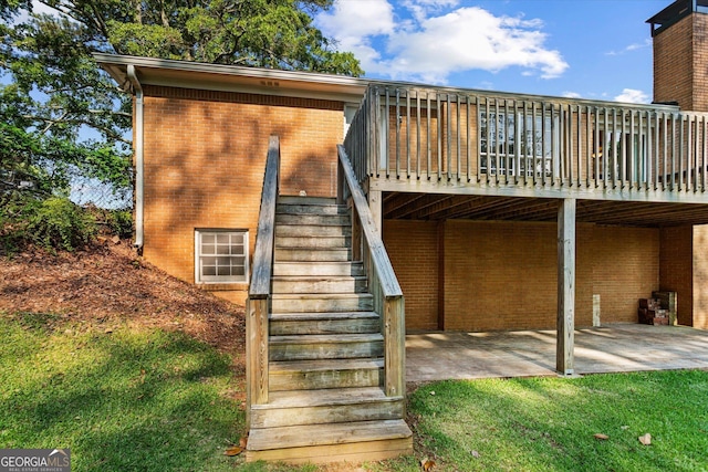 315 Burke Cir, Mcdonough, GA 30253 - back of house featuring stairway, a patio area, a deck, and brick siding