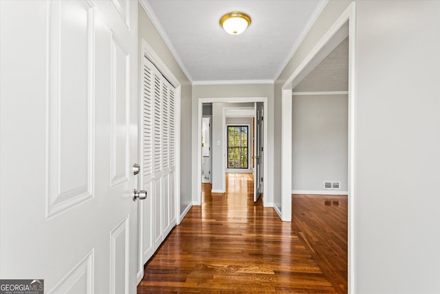 315 Burke Cir, Mcdonough, GA 30253 - corridor with wood finished floors, baseboards, and ornamental molding