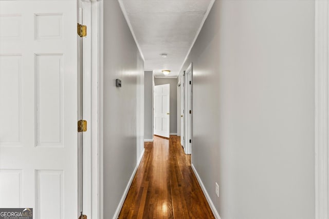 315 Burke Cir, Mcdonough, GA 30253 - corridor featuring dark wood-style floors and baseboards