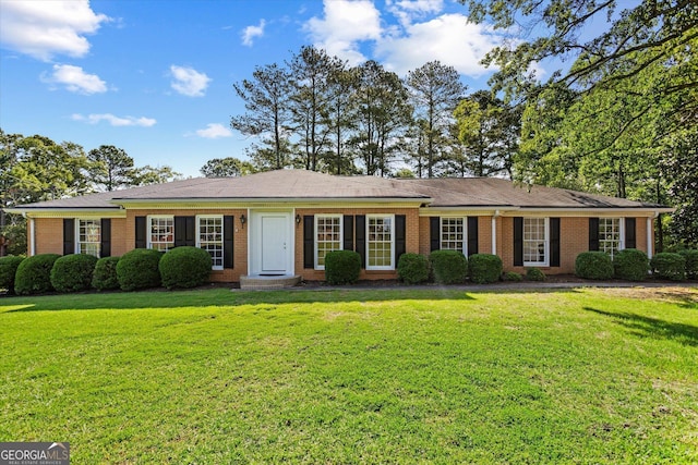 315 Burke Cir, Mcdonough, GA 30253 - ranch-style house with brick siding and a front yard