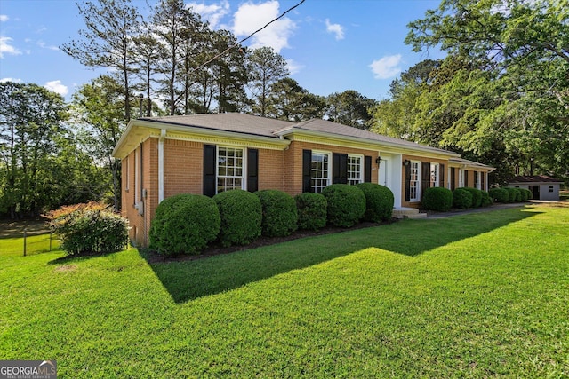315 Burke Cir, Mcdonough, GA 30253 - view of front facade featuring brick siding and a front lawn