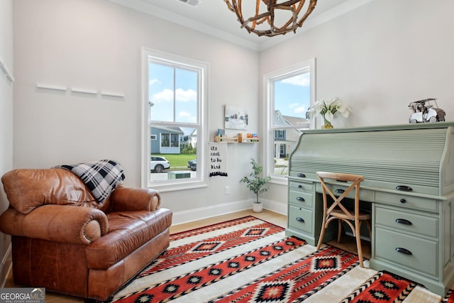 247 Widener Way, Peachtree City, GA 30269 - home office with a chandelier, plenty of natural light, baseboards, and light wood-style floors