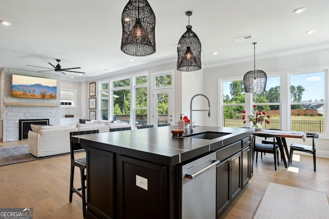 247 Widener Way, Peachtree City, GA 30269 - kitchen featuring a sink, dishwasher, ornamental molding, healthy amount of natural light, and ceiling fan