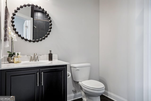 247 Widener Way, Peachtree City, GA 30269 - bathroom with baseboards, vanity, and toilet