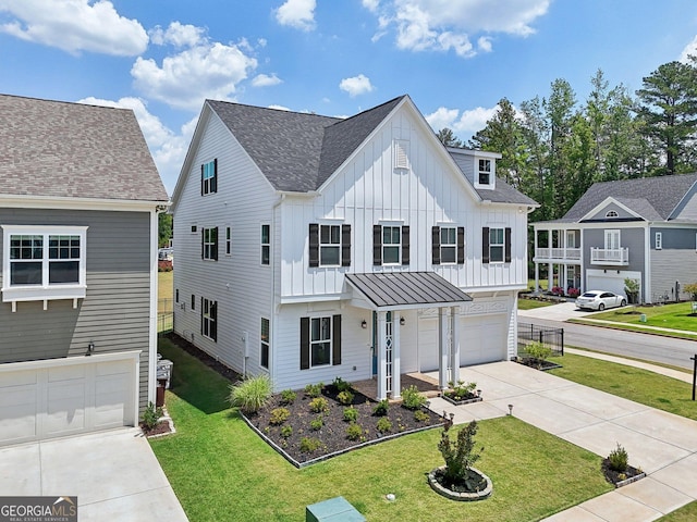 247 Widener Way, Peachtree City, GA 30269 - view of front facade with driveway, a garage, board and batten siding, a front lawn, and a shingled roof