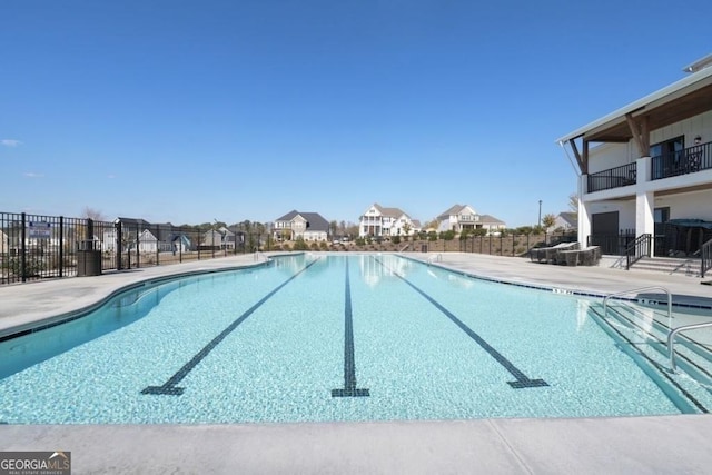 247 Widener Way, Peachtree City, GA 30269 - community pool featuring a patio area and a residential view