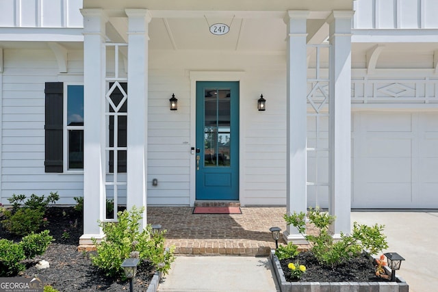247 Widener Way, Peachtree City, GA 30269 - property entrance with a porch and board and batten siding