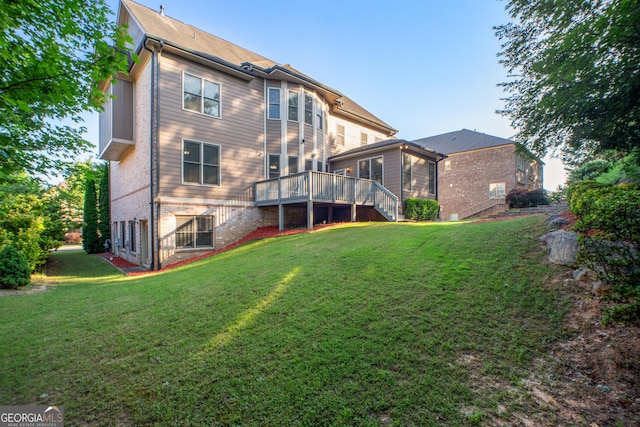 2604 Heltonwood Ct, Buford, GA 30519 - back of house featuring stairway, a lawn, and a wooden deck