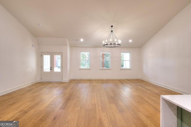 1947 Clark Dr, Tucker, GA 30084 - unfurnished room with a chandelier, baseboards, light wood-style flooring, recessed lighting, and vaulted ceiling