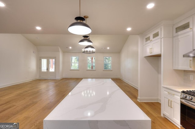 1947 Clark Dr, Tucker, GA 30084 - kitchen with gas range, open floor plan, white cabinets, light wood finished floors, and recessed lighting