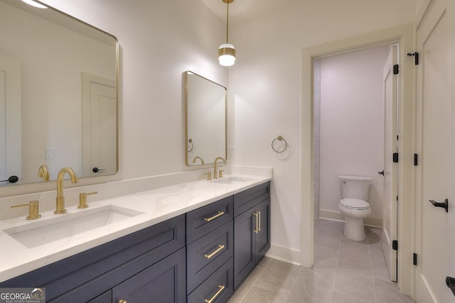 1947 Clark Dr, Tucker, GA 30084 - bathroom featuring double vanity and toilet