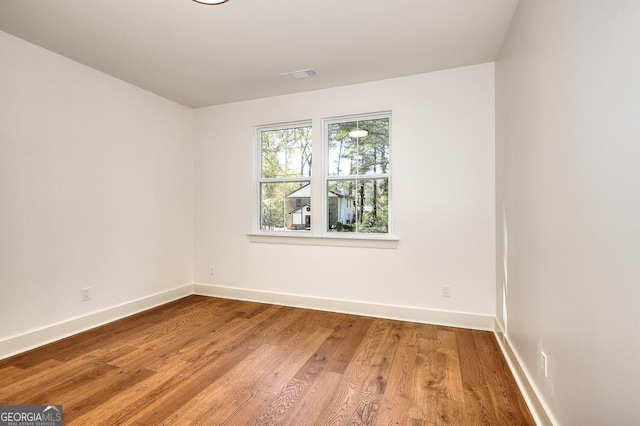 1947 Clark Dr, Tucker, GA 30084 - unfurnished room with baseboards and wood finished floors