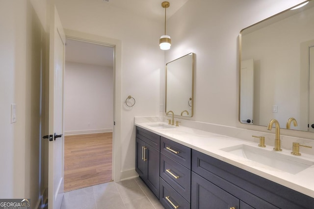 1947 Clark Dr, Tucker, GA 30084 - full bathroom with double vanity, tile patterned flooring, and baseboards