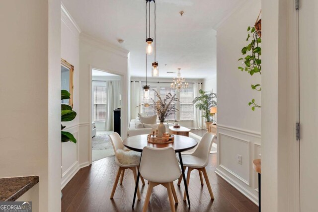 1850 Cotillion Dr Unit 2304, Atlanta, GA 30338 - dining area featuring crown molding, dark wood-style floors, plenty of natural light, and a chandelier