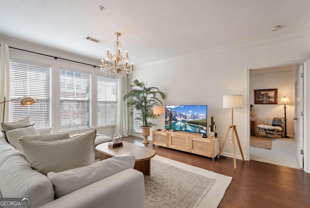 1850 Cotillion Dr Unit 2304, Atlanta, GA 30338 - living area with a chandelier, dark wood-style floors, crown molding, and baseboards