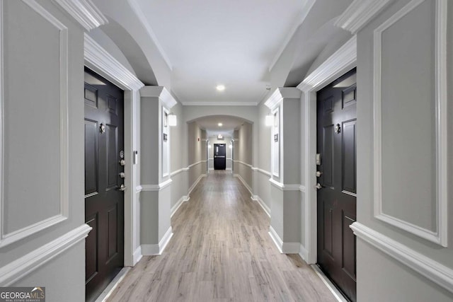 1850 Cotillion Dr Unit 2304, Atlanta, GA 30338 - entryway featuring arched walkways, light wood-type flooring, baseboards, crown molding, and recessed lighting