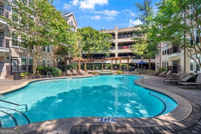 1850 Cotillion Dr Unit 2304, Atlanta, GA 30338 - community pool featuring a patio