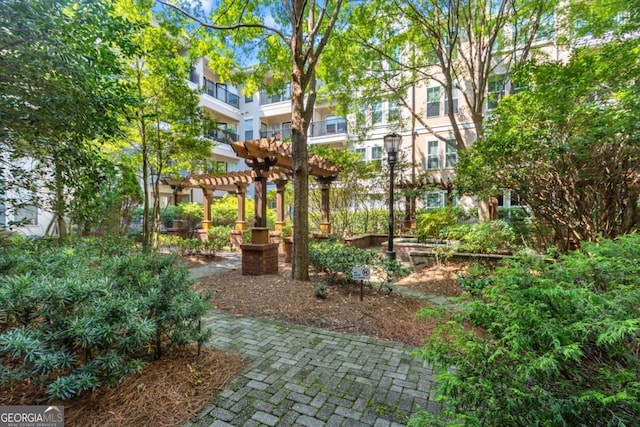 1850 Cotillion Dr Unit 2304, Atlanta, GA 30338 - view of yard featuring a pergola