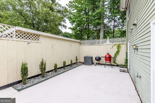 1701 Wiscasset Pl, Tucker, GA 30084 - fenced backyard featuring a patio area and central AC unit