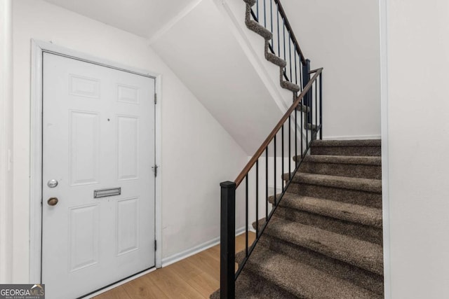 1701 Wiscasset Pl, Tucker, GA 30084 - stairs featuring wood finished floors and baseboards