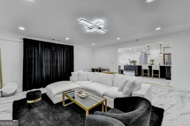 3799 Sweetbriar Cir, Lithia Springs, GA 30122 - living area featuring light marble finish flooring and recessed lighting